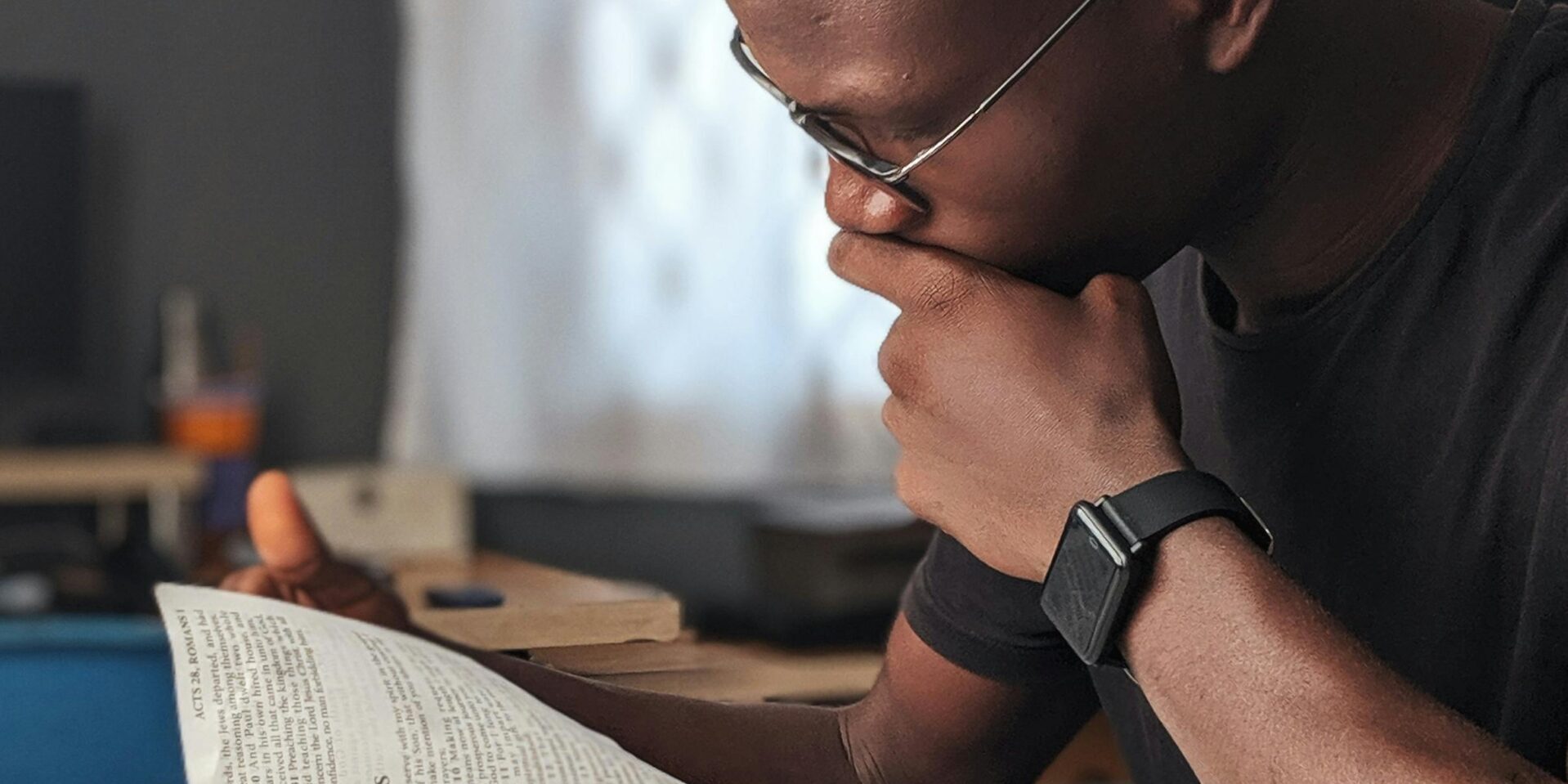 pexels-diimejii-3118214 A man studies a Bible